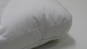 Подушка45х65смFAMILYTEX с вертикальной перегородкой полукруглым валиком.Высота15см.Наполнитель полиэфирное волокно.Наперник ТИК 50%полиэстер 50%хлопок 000000000001206189